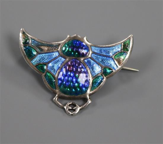 An Edwardian Art Nouveau silver and polychrome enamel Bat brooch, by Charles Horner, Chester, 1909, 32mm.